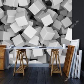 Wizualizacja fototapety z efektem 3D przedstawia spadające, białe bryły geometryczne. Fototapeta do pokoju dziennego, młodzieżowego, sypialni, salonu, biura, gabinetu, przedpokoju i jadalni.